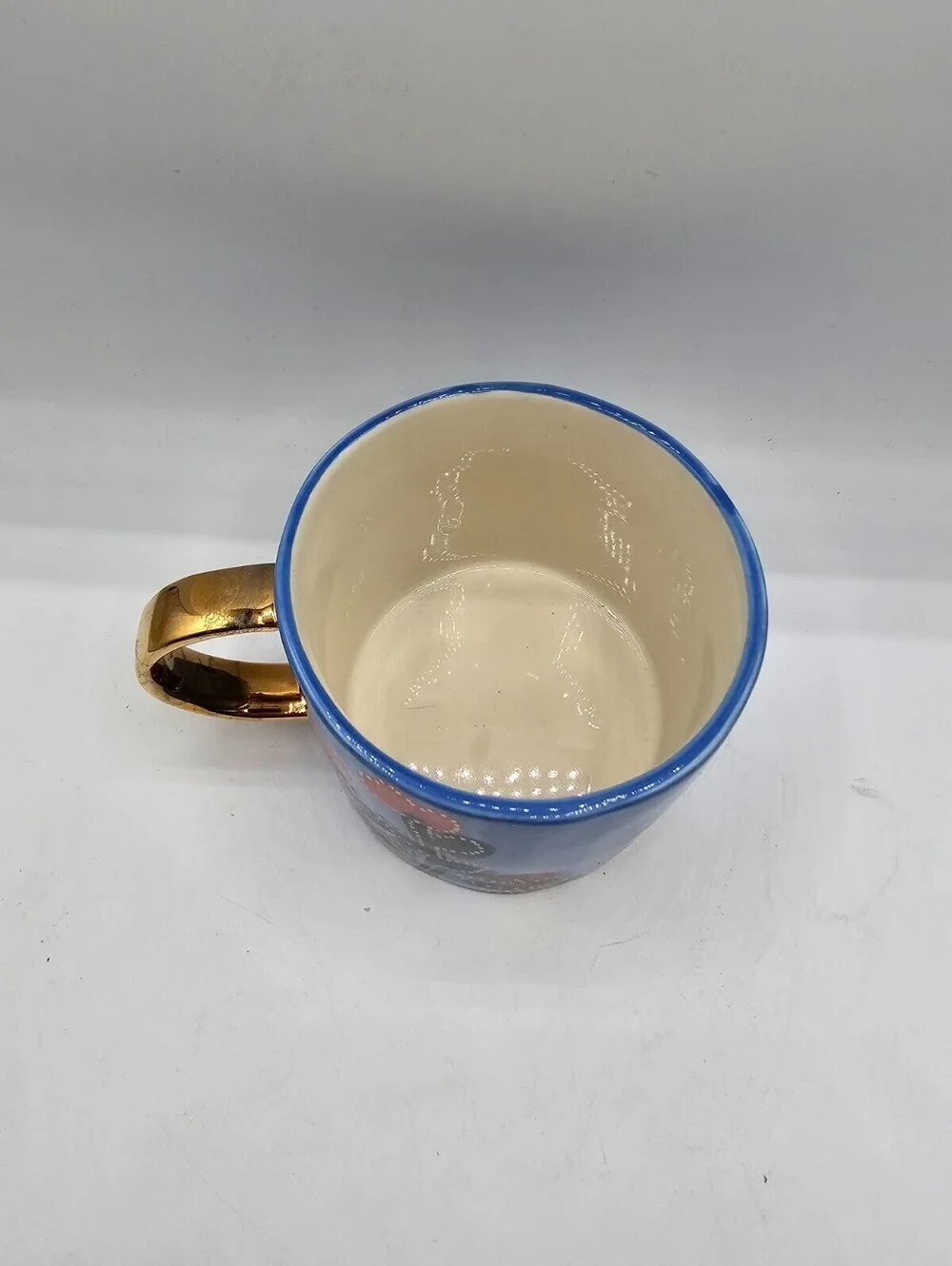 Anthropologie Francesca Kaye Atelier floral mug with a blue body